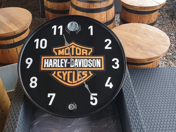 Large clock made from oil barrel football teams