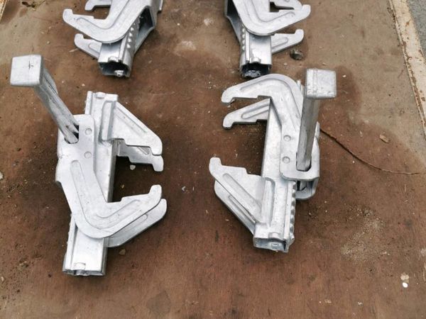 Shuttering clamps and lifting hooks