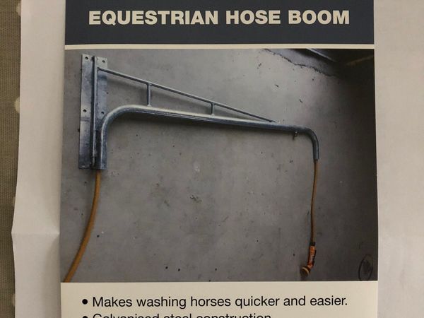 Equestrian hose boom