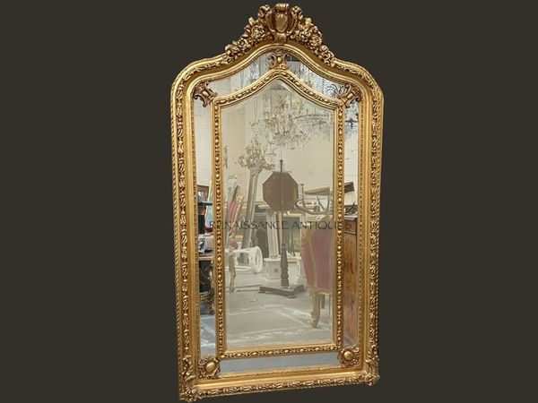 Full length casrved wood gilt mirror