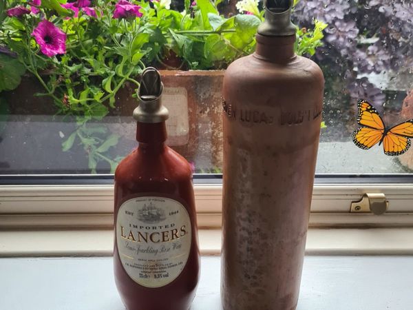 2 Vintage Stoneware bottles with original pourers.