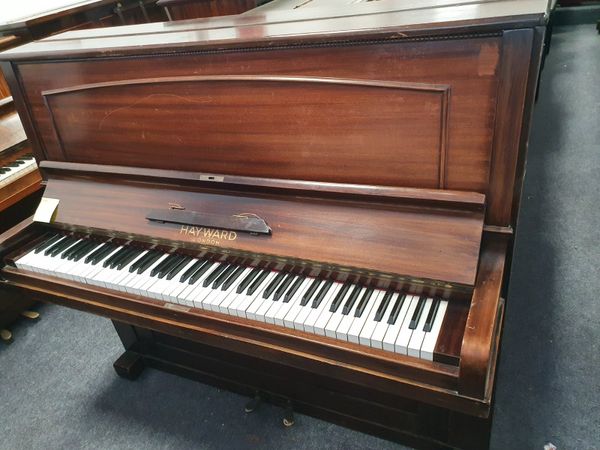 Second hand deals piano store