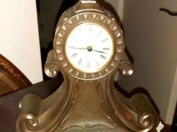 Genesis bronze clock