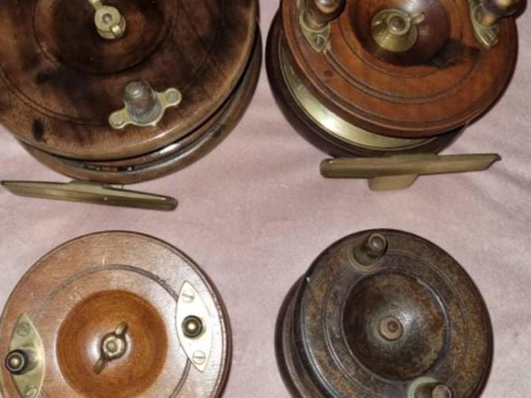 Selection of wood and brass fishing reels