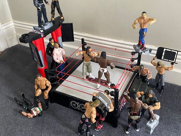 WWE action figures, wrestling ring and accessories