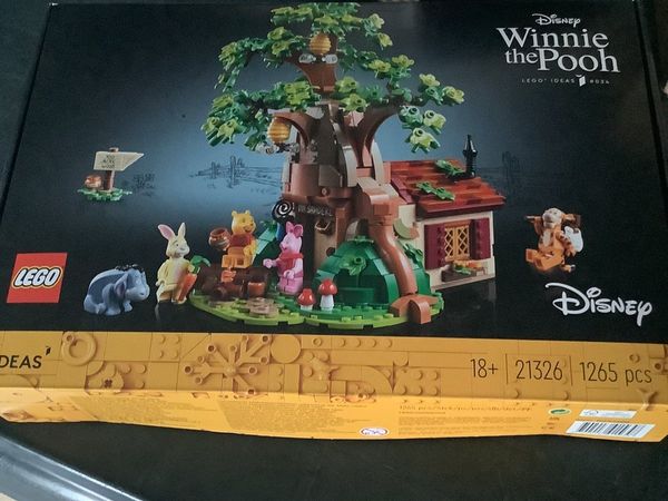 NEW UNOPENED WINNIE THE POOH AND FREE CAR.
