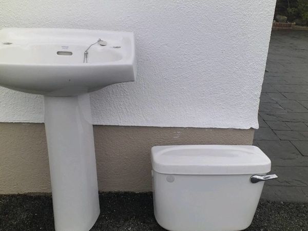 Hand basin pedestal. Toilet cistern