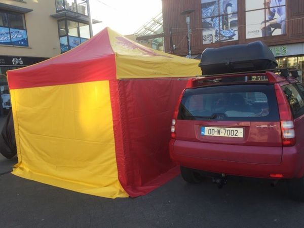 MASTERTENT GAZEBO IN RED AND YELLOW THE ROLLS-ROYCE OF CATERING TENTS.