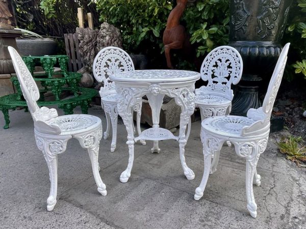 Cast iron garden discount table and chairs