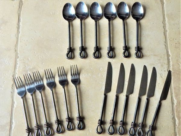 Collection of wrought iron cutlery