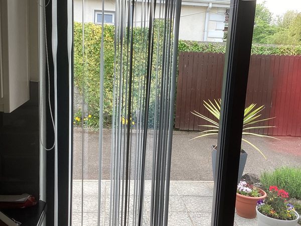 Grey vertical blind for patio door with fittings