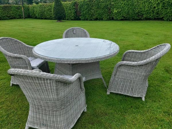 Garden table with 4 chairs  and parasol