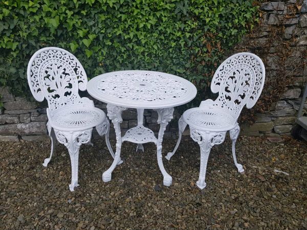 Solid cast iron tables and chairs