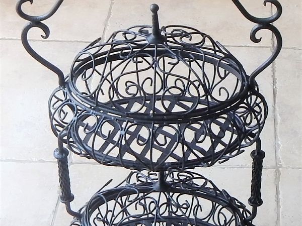 Vintage wrought iron double basket stand