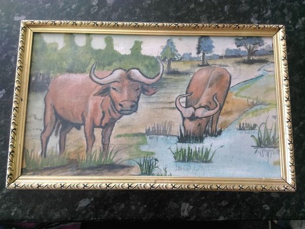 Water buffalo painting on board