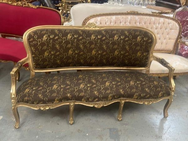 Old gilt sofas