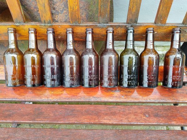 9. Vintage GOGGIN, Kanturk glass bottles