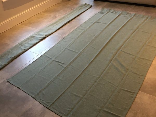 Pair of Ikea green curtains