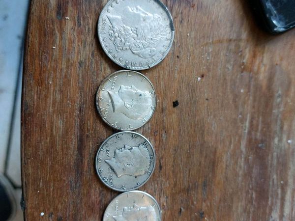 4 1964 half dollars 2 Morgan dollars 1880 1884