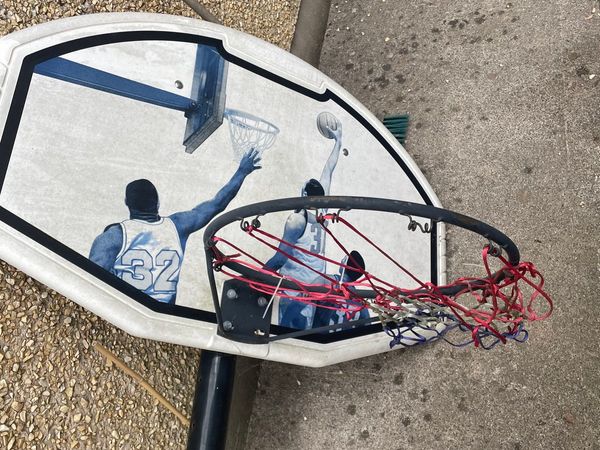 Basketball net and pole