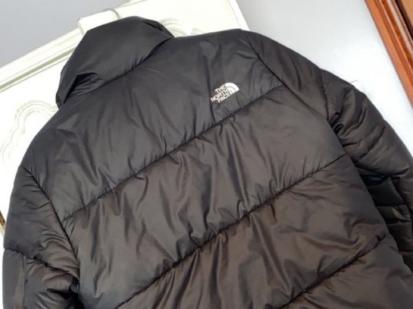 The North Face black women’s puffer jacket