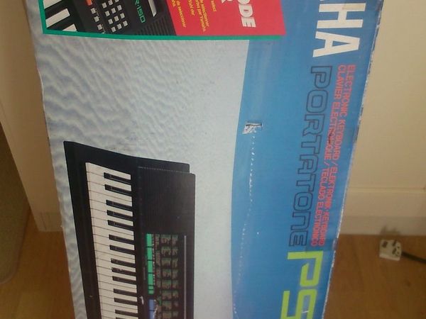 Yamaha Keyboard & Stand + 2 Free Music Books Bought Separately