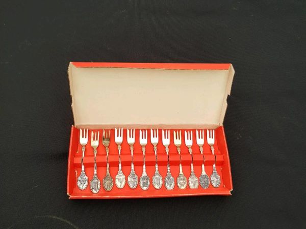 Lot of souvenirs cake forks