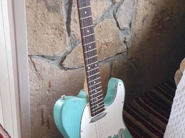 Telecaster style electric guitar