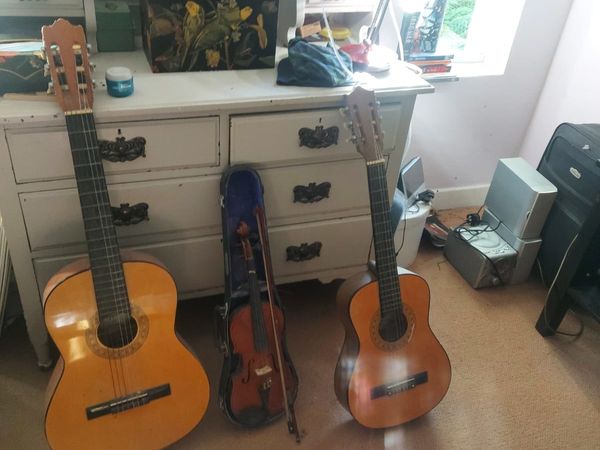 2 guitars and violin