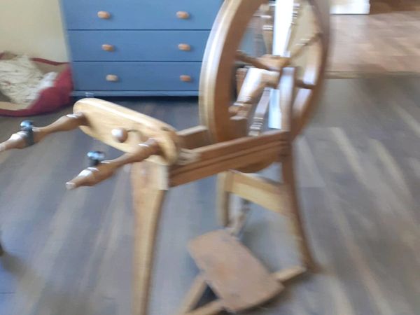 Wooden spinning wheel.