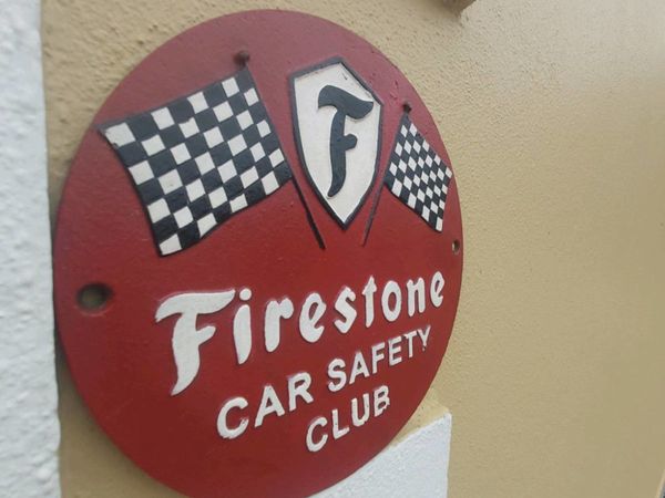 Firestone tyres cast iron sign