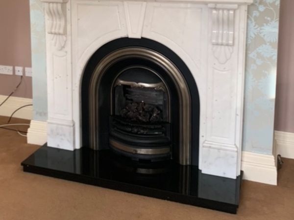 Gas Fireplace and marble surround mantle