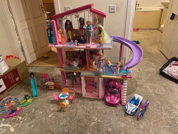 Barbie Dreamhouse with 21 dolls and accessories