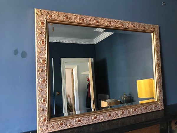 Framed bevelled mirror