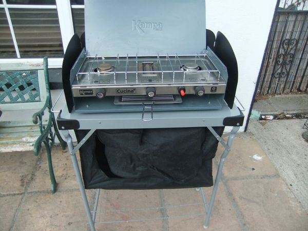 Camping cooker with stand