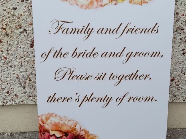 Wedding guests sign