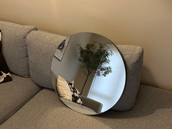 Modern black round mirror