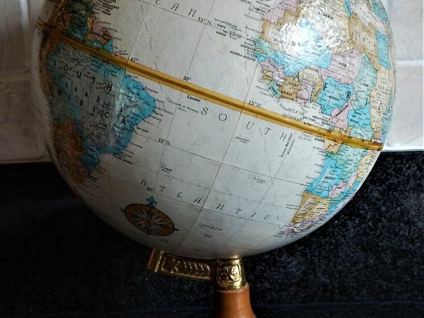 Replogle brand vintage embossed globe on wood base