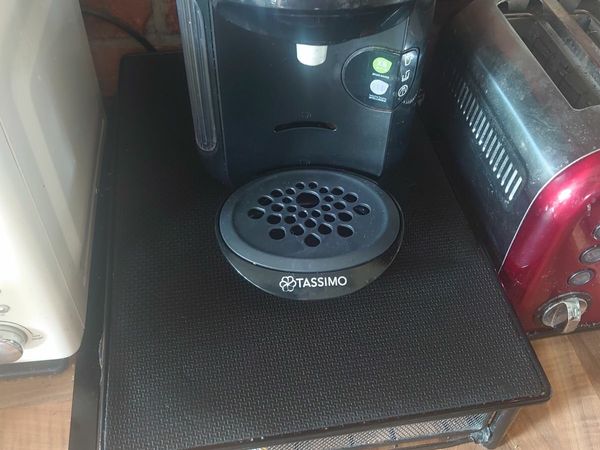 Tassimo Coffee machine with Pod stand (60) and Coffee pot.