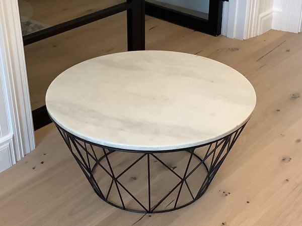 Round marble top coffee table with black iron base