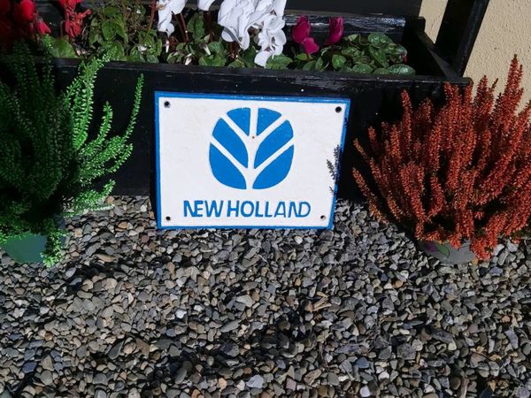 Newhollond tractor cast iron sign