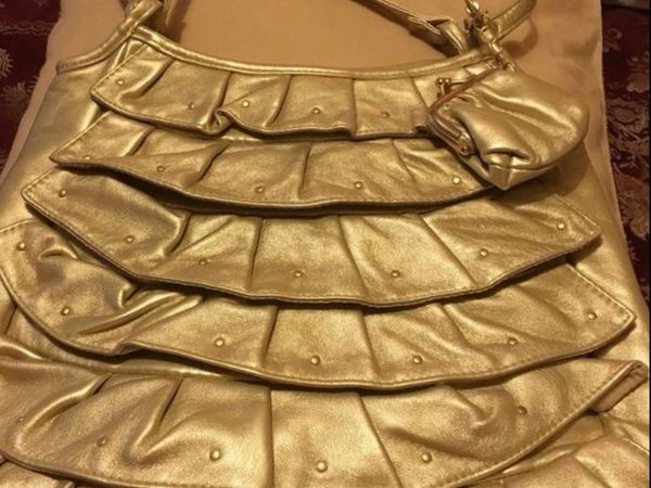 Ladies gold bag & purse €10