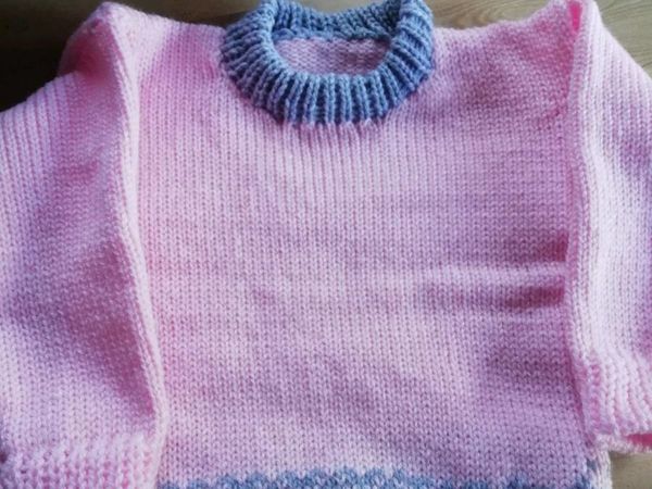 Hand knitted jumpers and cardigans