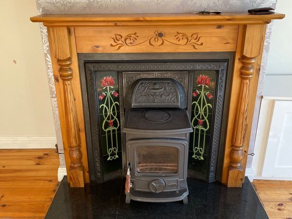 Stanley stove, cast iron insert, fireplace and hearth
