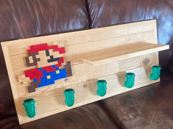 Super Mario themed wooden coat hanger