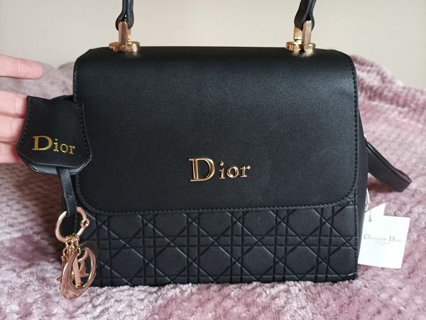 Brand new Christian Dior hand bag and purse