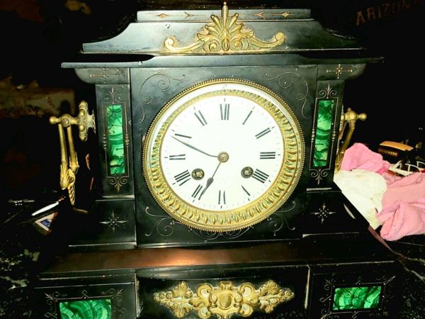 Antique black marble and brass mantel clock