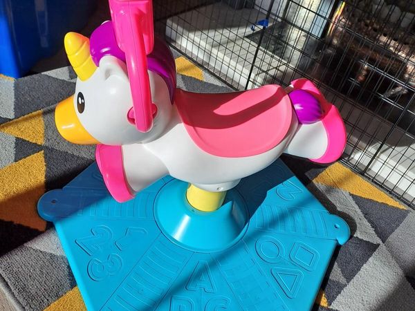 Fisher price bounce & spin unicorn ride on