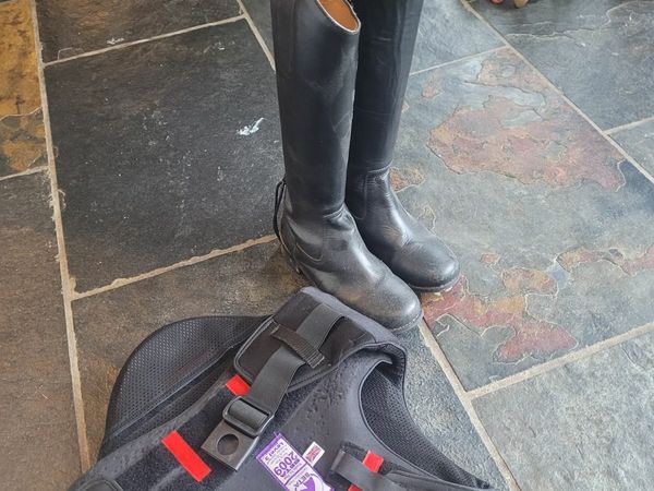 Girls horse riding boots and body protector