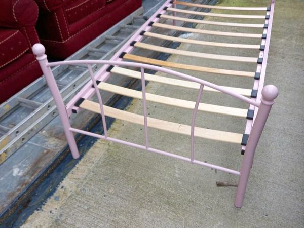 Pink. Single bed in excellent condition